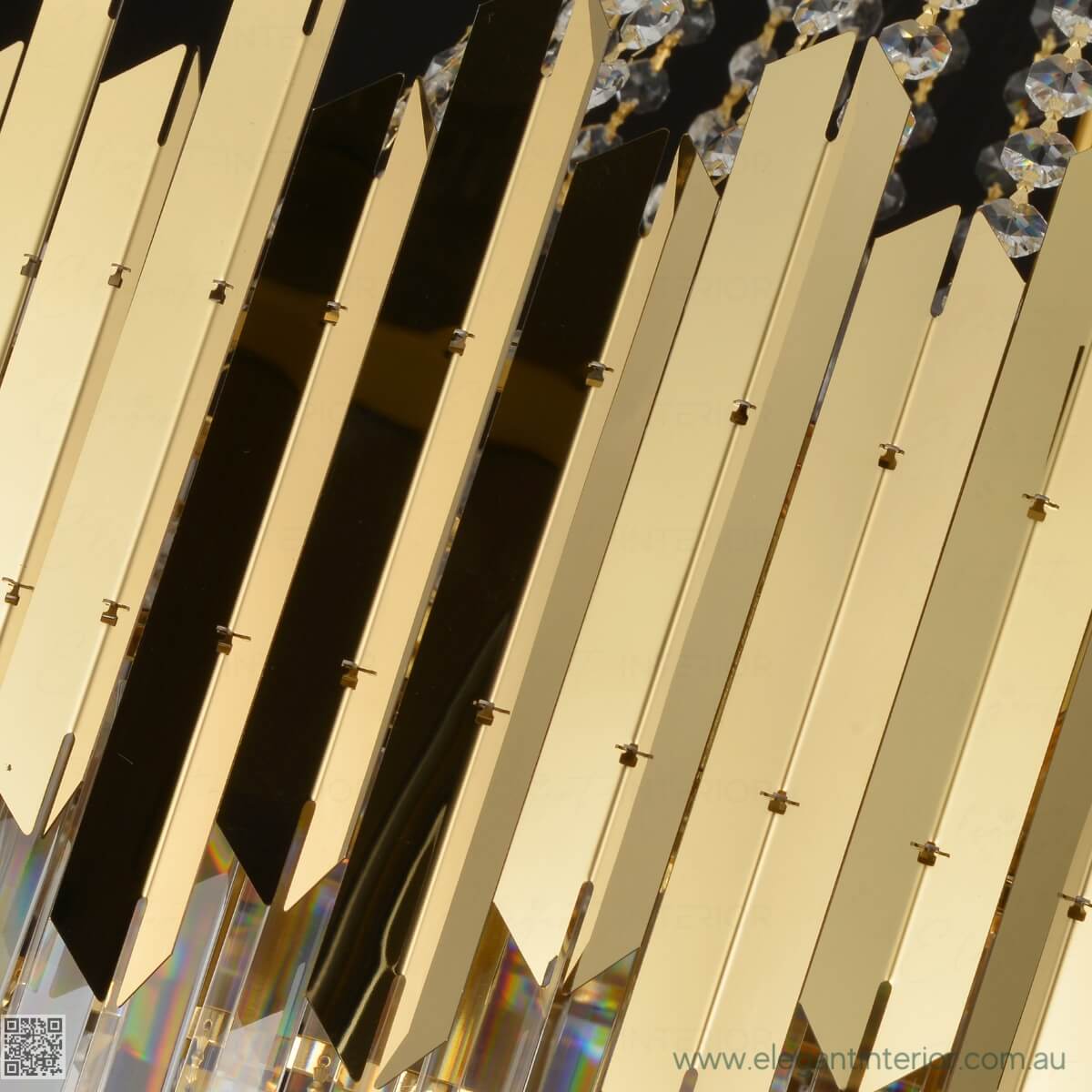 Detailed view of Grand Tara chandelier showcasing elegant gold frame and sparkling crystal accents