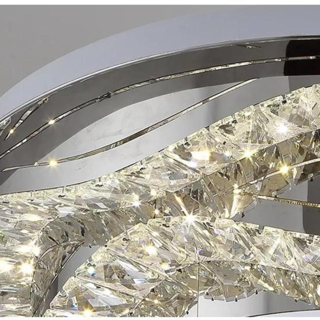  Detailed view of Isabelle Lux Decor LED chandelier showcasing stainless steel and K9 crystal