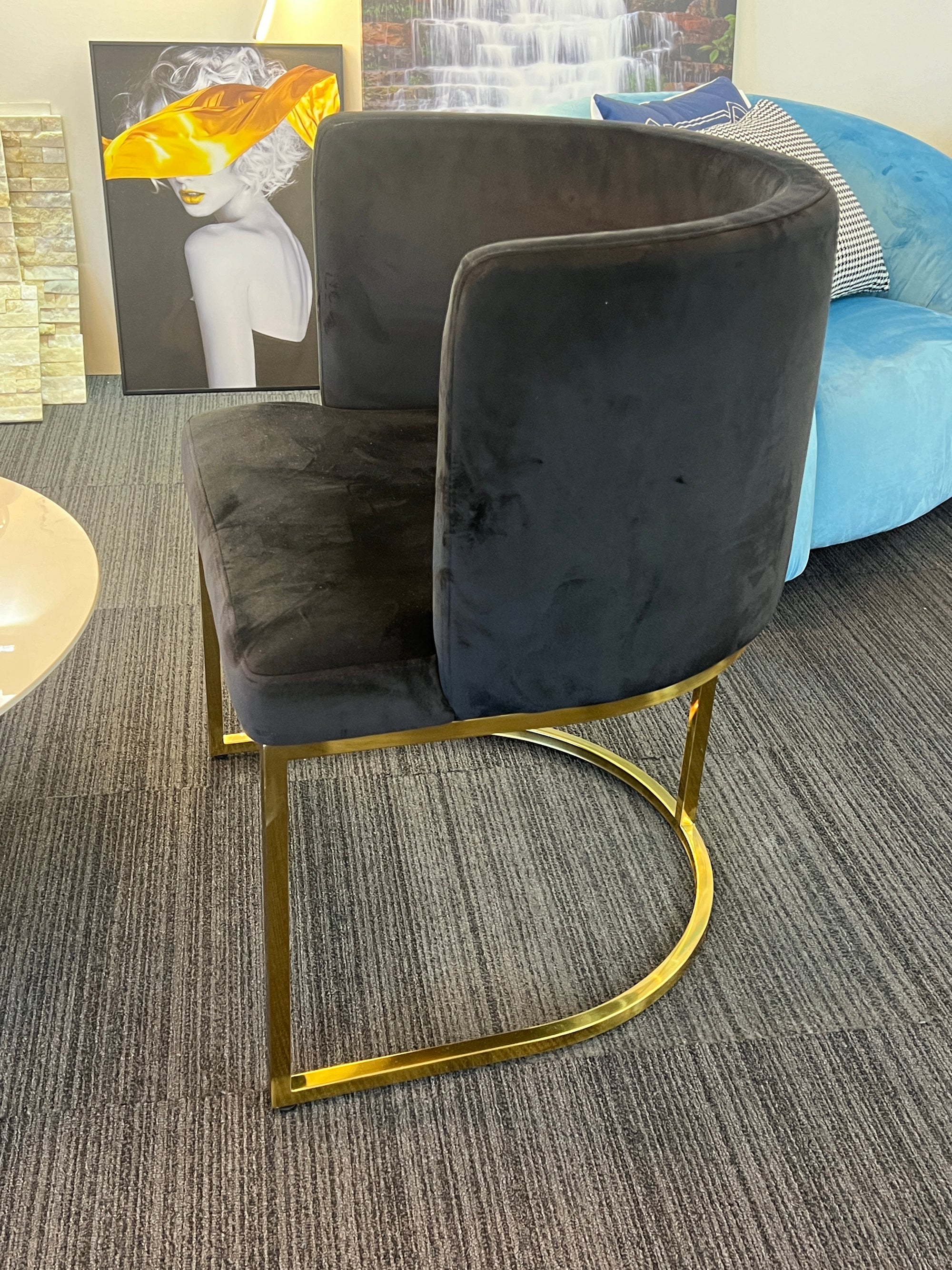Kate display chair in black, non-returnable, modern sleek design for stylish interiors