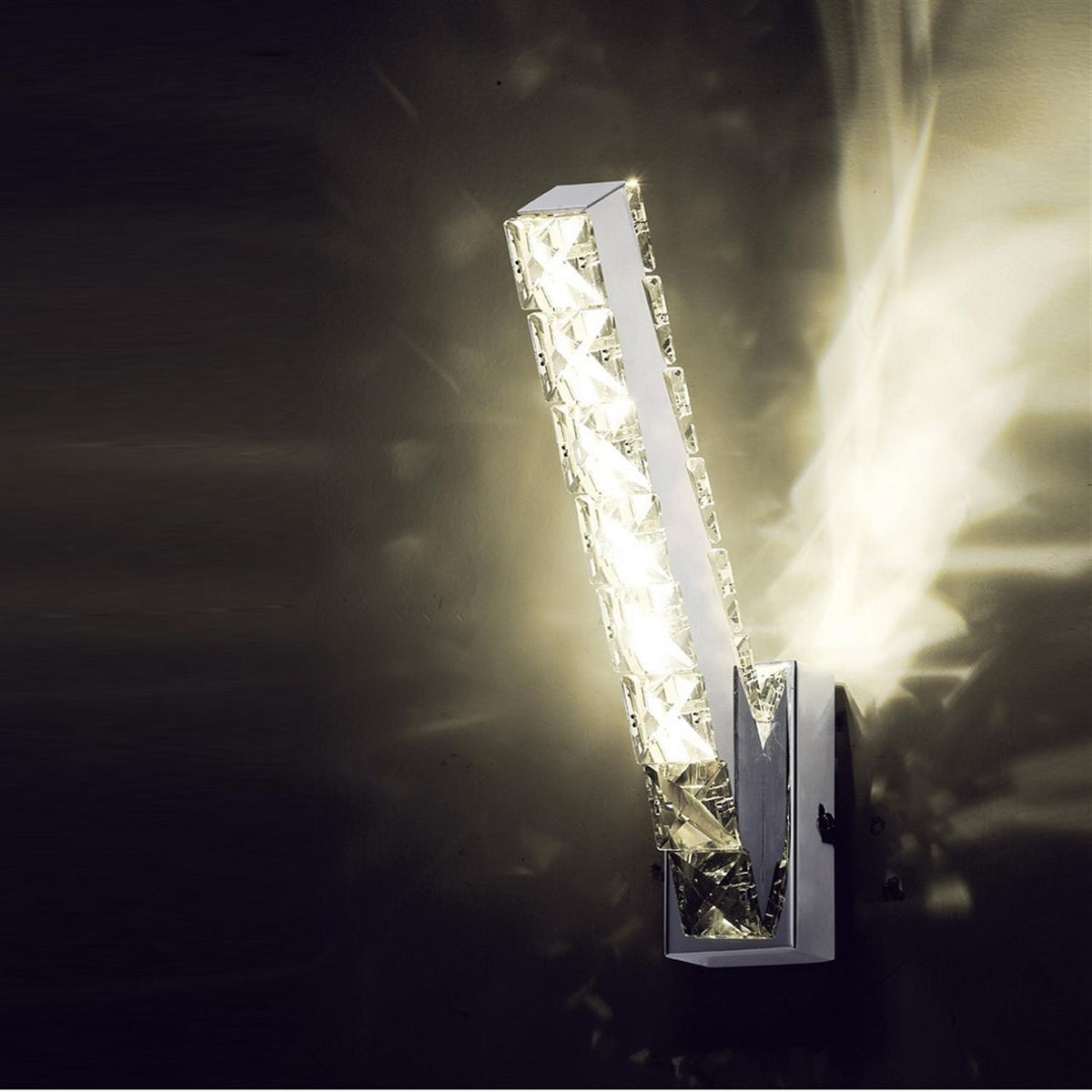 Front view of Seema polished chrome and crystal vertical LED wall light with sleek design