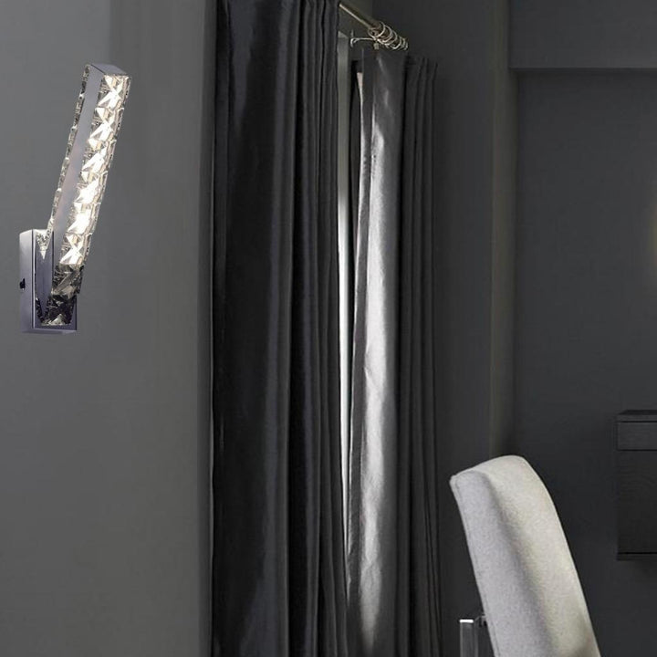 Seema polished chrome and crystal vertical LED wall light mounted on elegant side wall