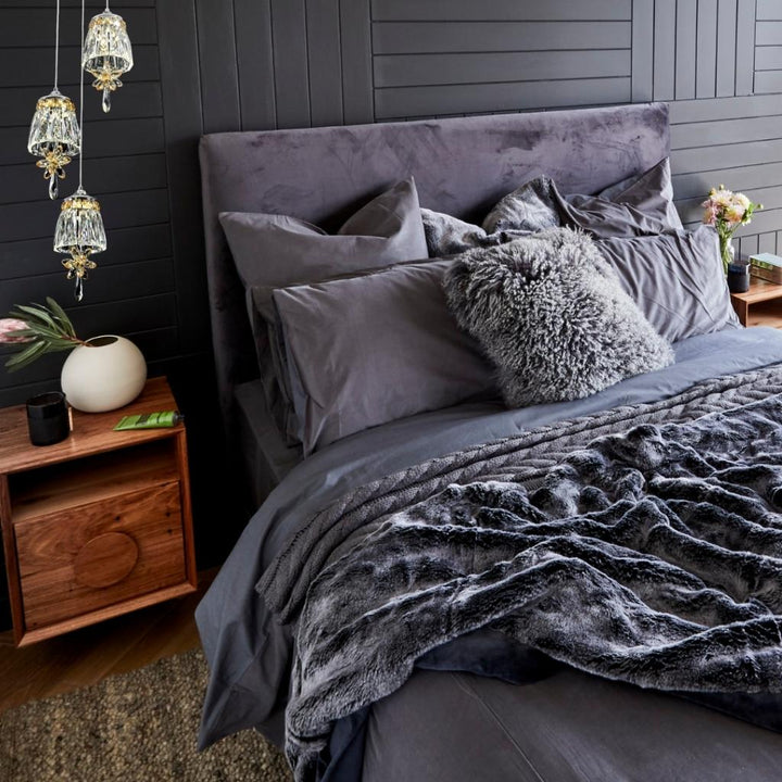 Alina decorative 3-light pendant light in bedroom setting with cozy modern design