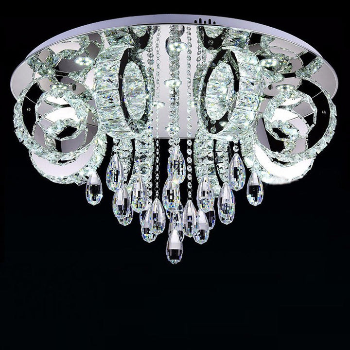 Front view of Rihanna LED gold chandelier light turned on, showcasing elegant crystal lighting design.