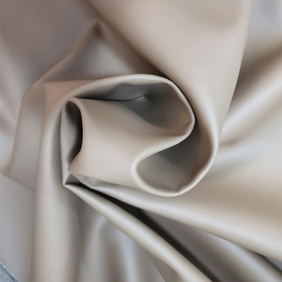 Close-up details of Simplicity modern leather living room sofa set, highlighting premium leather texture and craftsmanship