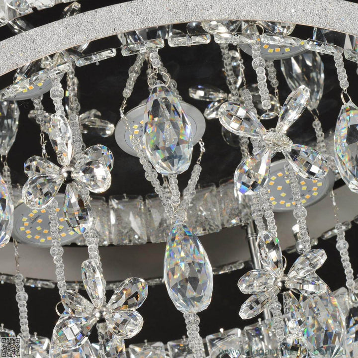 Close-up detail of Monica chandelier ceiling light showcasing intricate design elements