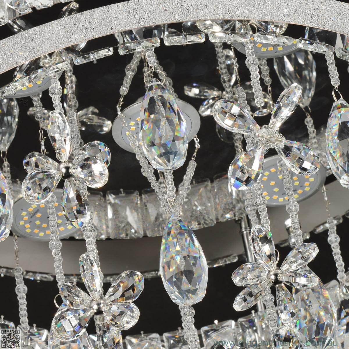 Close-up detail of Monica chandelier ceiling light showcasing intricate design elements